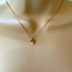 Swarovski Rose Gold Color Round Pendant